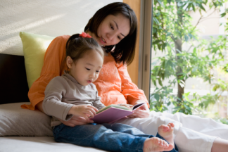 Mother reading to child