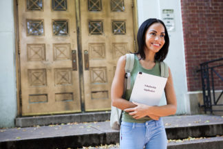 Woman with scholarship application